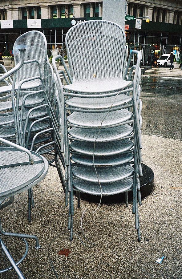 Stacked metal chairs in New York City